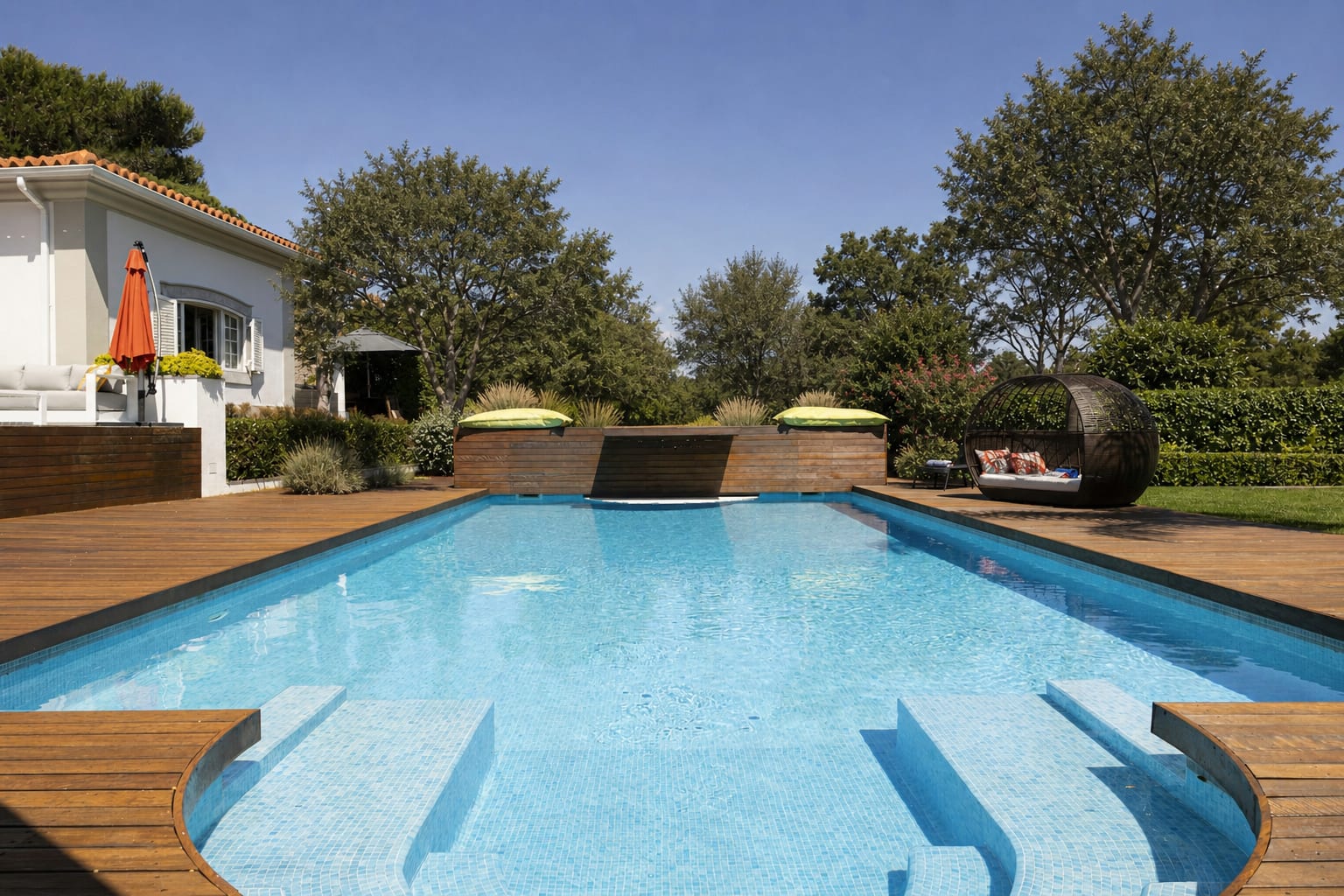 Bright backyard pool with clear, professionally maintained water